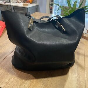 Black faux leather purse and accessory bag. Gold zippers. Large bag. Like new.